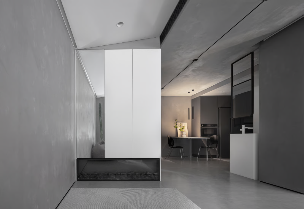 Pemisahan area publik dan privat pada rumah tingkat minimalis dengan tangga sebagai pembatas zonasi ruang