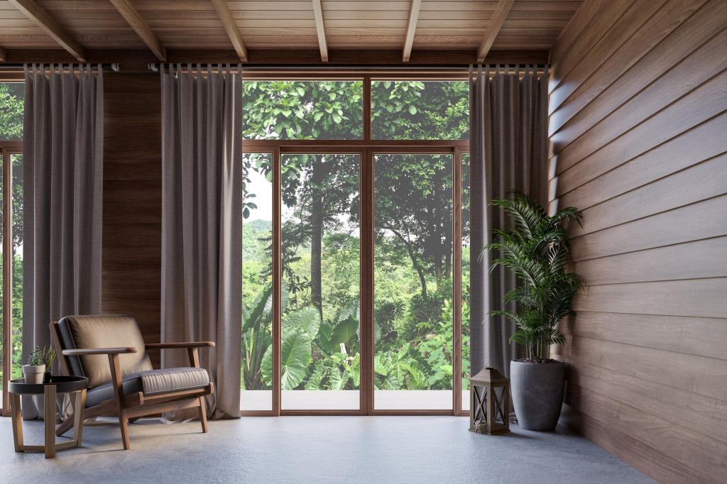 Rumah kayu minimalis dengan jendela besar untuk pencahayaan alami maksimal